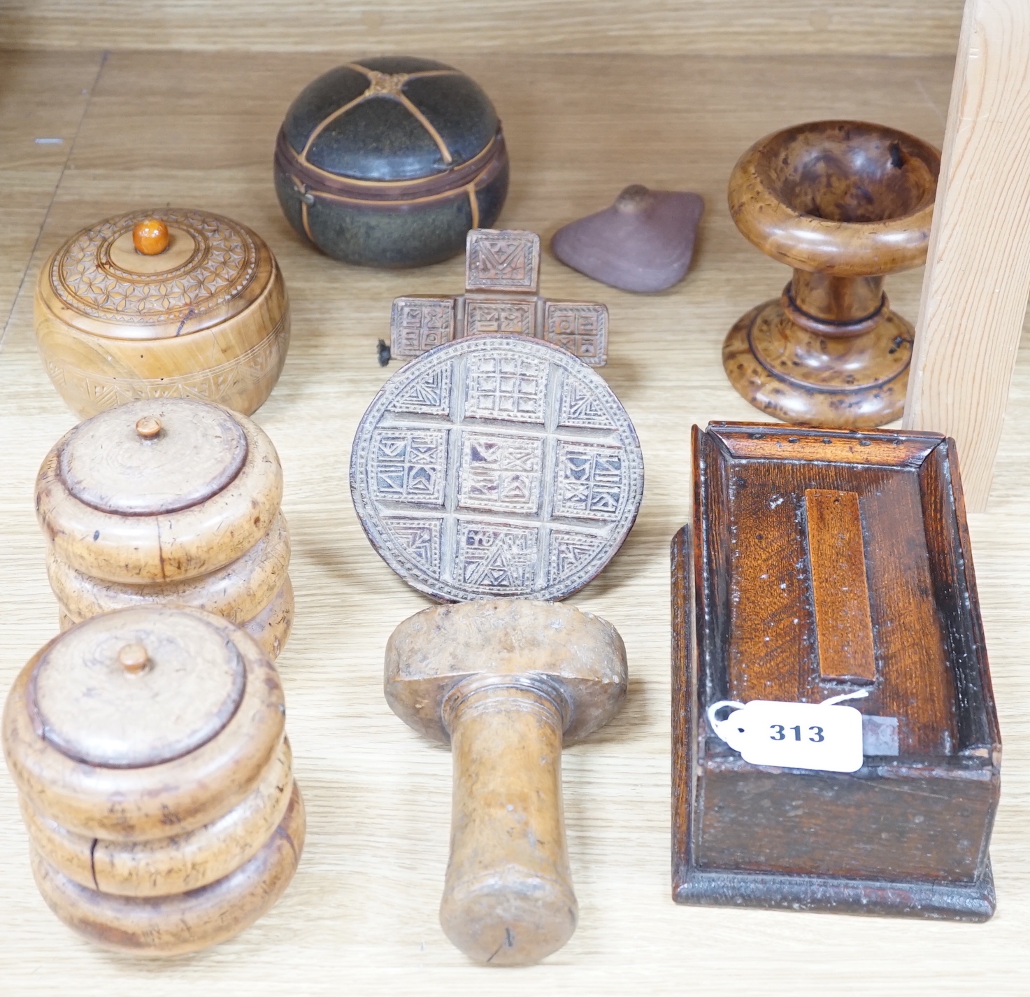 An 18th century oak salt/herb box, a collection of treen boxes, wood block and a pottery box and stone (10), salt box 31cms high